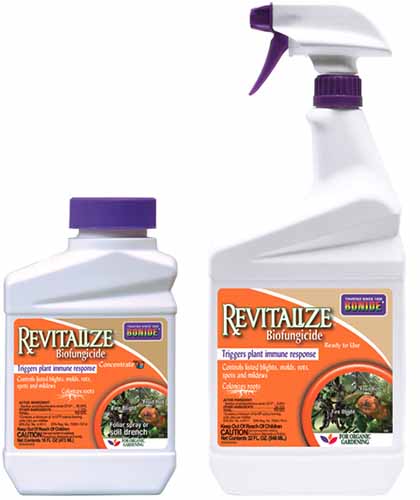 A close up of two bottles of Bonide Revitalize isolated on a white background.